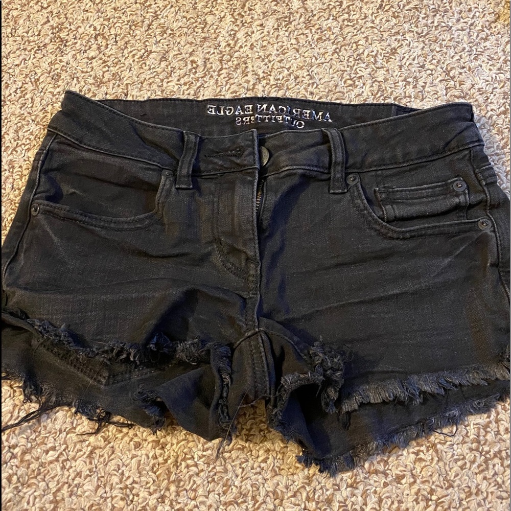 Black shorts! Lighting is off.
